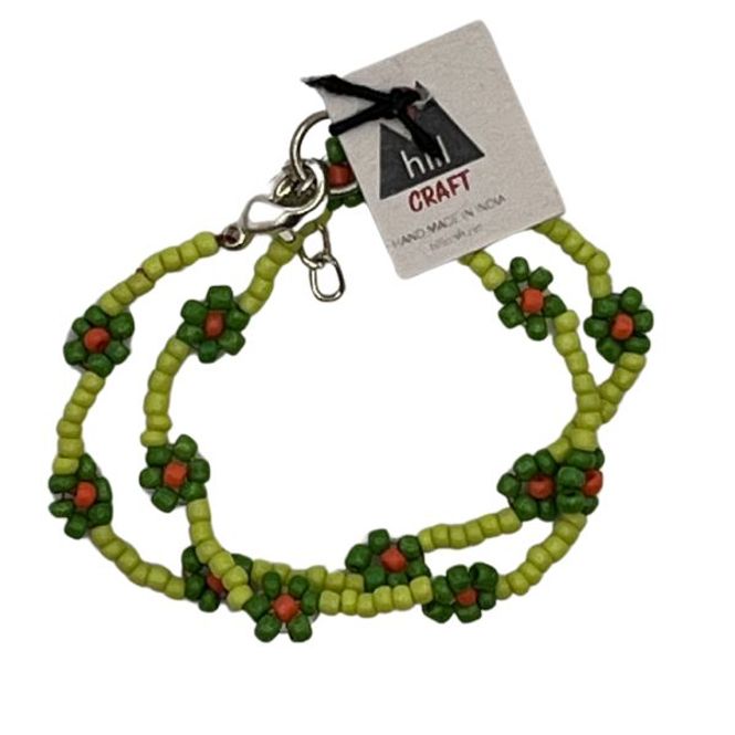 Hovedbilde Ankelsmykke med grønne blomster